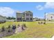 Charming two-story home with gray siding, black shutters and manicured front yard at 651 Choctaw Dr., Conway, SC 29526