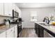 Well-equipped kitchen featuring granite countertops, stainless steel appliances and plenty of counter space at 651 Choctaw Dr., Conway, SC 29526