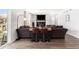 Cozy living room with hardwood floors, comfortable sofa, and a view to the outside at 651 Choctaw Dr., Conway, SC 29526