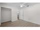 Bedroom featuring wood floors, a walk-in closet, and neutral paint at 6576 Pebble Beach Crescent, Myrtle Beach, SC 29588