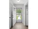 Entryway with a storm door and view of the front walkway at 6576 Pebble Beach Crescent, Myrtle Beach, SC 29588