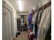 Walk-in closet featuring ample shelving and storage racks for clothes and accessories at 671 American Beech St., Loris, SC 29569