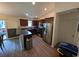 Modern kitchen with stainless steel appliances, and convenient bar seating at 671 American Beech St., Loris, SC 29569