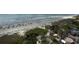 Aerial view of the beach, ocean and community picnic area below at 6900 N Ocean Blvd. # 201, Myrtle Beach, SC 29572