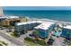 Aerial view of beachfront condo complex, including pool and surrounding landscape at 720 N Waccamaw Dr. # 205, Garden City Beach, SC 29576