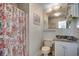 Bathroom with shower/tub combination and a decorative shower curtain at 720 N Waccamaw Dr. # 205, Garden City Beach, SC 29576