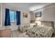 Comfortable bedroom with twin beds, seaside decor and ample natural light at 720 N Waccamaw Dr. # 205, Garden City Beach, SC 29576