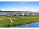 An aerial view of a community of homes near the waterway at 7374 Sarteano Dr., Myrtle Beach, SC 29572