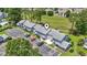 Aerial view of townhouses with parking, driveways, and landscaping at 775 Plantation Dr. # 53, Little River, SC 29566