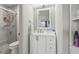 Well-lit bathroom with a modern vanity, frameless shower, and neutral walls at 775 Plantation Dr. # 53, Little River, SC 29566