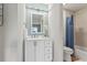 Bathroom with white vanity, a decorative mirror, modern lighting, and a shower-tub combination at 775 Plantation Dr. # 53, Little River, SC 29566