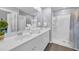 Clean bathroom featuring double sinks, a walk-in shower, and neutral decor for a refreshing experience at 788 Dusty Pine Way, Myrtle Beach, SC 29588