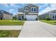 Charming two-story home featuring a two-car garage, landscaped front yard and covered entry at 788 Dusty Pine Way, Myrtle Beach, SC 29588