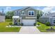 Charming two-story home featuring a two-car garage, landscaped front yard and covered entry at 788 Dusty Pine Way, Myrtle Beach, SC 29588