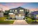 Charming two-story home featuring a two-car garage, landscaped front yard and covered entry at 788 Dusty Pine Way, Myrtle Beach, SC 29588