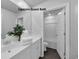 Pristine guest bathroom features a modern vanity, sleek sink, and tiled shower for a luxurious experience at 788 Dusty Pine Way, Myrtle Beach, SC 29588