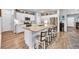 Bright, open kitchen with a large island, stainless steel appliances, and granite countertops at 788 Dusty Pine Way, Myrtle Beach, SC 29588