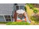 Overhead angle of outdoor wooden deck with umbrella and outdoor seating at 890 Knoll Dr., Little River, SC 29566