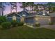 Charming home featuring a two-car garage, manicured lawn and low foundation shrubbery at 890 Knoll Dr., Little River, SC 29566