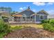 Backyard view of home's back deck and siding at 890 Knoll Dr., Little River, SC 29566