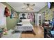 This bedroom features hardwood floors, a neutral rug, and a cozy atmosphere at 903 N Park St. Ext., Mullins, SC 29574