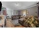 Comfortable living room featuring hardwood floors, area rug, and cozy decor at 903 N Park St. Ext., Mullins, SC 29574