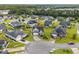 Beautiful aerial shot of a landscaped home in a friendly neighborhood with mature trees at 908 Ashbourn Ct., Murrells Inlet, SC 29576