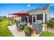 Outdoor patio featuring a grilling area and covered dining space at 908 Ashbourn Ct., Murrells Inlet, SC 29576