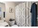 Bathroom featuring a patterned shower curtain, a toilet, and an adjacent vanity at 908 Ashbourn Ct., Murrells Inlet, SC 29576