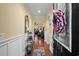 Elegant entryway with hardwood floors, decorative accents, and an open view to the living spaces at 908 Ashbourn Ct., Murrells Inlet, SC 29576