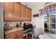 Charming kitchen nook featuring ample storage, granite countertops, and a cozy seating area at 908 Ashbourn Ct., Murrells Inlet, SC 29576