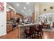 Open concept kitchen with stainless steel appliances, granite countertops, and breakfast bar seating at 908 Ashbourn Ct., Murrells Inlet, SC 29576