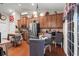 Spacious eat-in kitchen with stainless appliances, wooden cabinets, and natural light at 908 Ashbourn Ct., Murrells Inlet, SC 29576