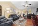 Spacious living room with plush seating, a decorative rug, and ample natural light at 908 Ashbourn Ct., Murrells Inlet, SC 29576