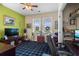 Cozy office featuring dark wood desk, ceiling fan and colorful decor at 908 Ashbourn Ct., Murrells Inlet, SC 29576