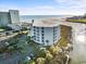 Overhead image showcasing waterway views, a golf course, and lush green landscaping at 9400 Shore Dr. # 409, Myrtle Beach, SC 29572