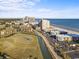 Beautiful aerial view of oceanfront condo building offering picturesque seaside living at 9400 Shore Dr. # 409, Myrtle Beach, SC 29572