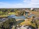 Lush aerial view of waterway, golf course and green landscape with residential homes at 9400 Shore Dr. # 409, Myrtle Beach, SC 29572