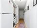 Condo hallway with wood flooring, leading to the main living areas and bedrooms at 9400 Shore Dr. # 409, Myrtle Beach, SC 29572