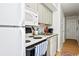 Galley kitchen with stainless steel appliances, granite countertops, and ample cabinet space at 9400 Shore Dr. # 409, Myrtle Beach, SC 29572