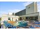 Inviting outdoor pool area with comfortable lounge chairs at beachfront condo at 9400 Shore Dr. # 409, Myrtle Beach, SC 29572
