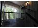 Private balcony with wooden deck and railing overlooking green foliage at 950 Forestbrook Rd. # B-8, Myrtle Beach, SC 29588