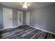 Bedroom features wood floors, light fixture, and neutral colored walls at 950 Forestbrook Rd. # B-8, Myrtle Beach, SC 29588