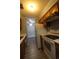 This kitchen features oak cabinets, light countertops, and stainless steel appliances at 950 Forestbrook Rd. # B-8, Myrtle Beach, SC 29588