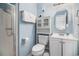 Bathroom with a shower, toilet, sink, medicine cabinet, and towel rack at 9501 Shore Dr. # 135, Myrtle Beach, SC 29572