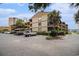 Exterior view of the community, highlighting parking, landscaping, and building design at 9501 Shore Dr. # 135, Myrtle Beach, SC 29572