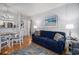 Inviting living and dining area offers a comfortable seating and a round glass dining table at 9501 Shore Dr. # 135, Myrtle Beach, SC 29572