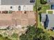 Townhome complex from above, showcasing the layout, private patios, parking, and surrounding landscape at 951 Plantation Dr. # F1, Little River, SC 29566