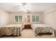 Bedroom featuring two twin beds, ceiling fan, windows and carpet flooring at 951 Plantation Dr. # F1, Little River, SC 29566