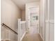 Hallway leading to a bedroom features carpeted floor and white door frames at 951 Plantation Dr. # F1, Little River, SC 29566